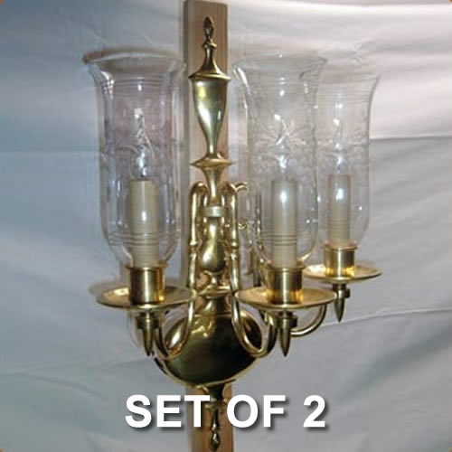 Pair of three-armed wall sconces signed Bradley & Hubbard