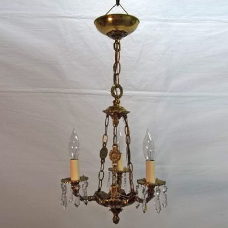 Cast brass three-armed chandelier signed Made in Spain