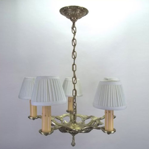 Cast brass chandelier with five arms signed SOL-RAY