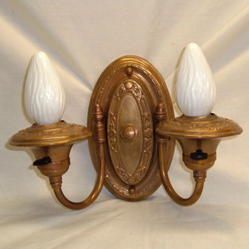 Double-armed brass wall sconce