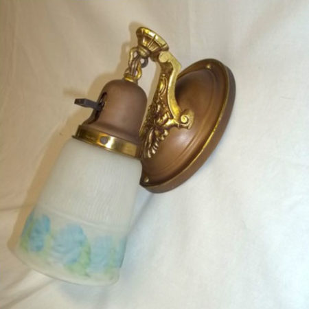 Single brass wall sconce with reverse painted shade