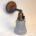Single brass wall sconce