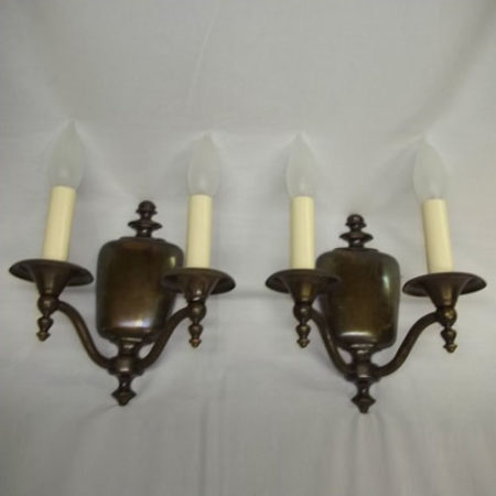 Pair of double-armed brass wall sconces