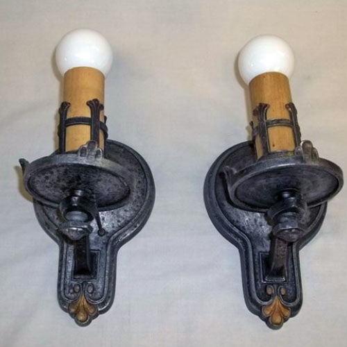 Pair of single-armed pewter wall sconces