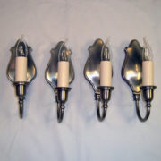 Set of four signed Bradley & Hubbard nickel wall sconces