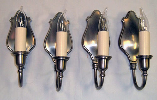 Set of four signed Bradley & Hubbard nickel wall sconces